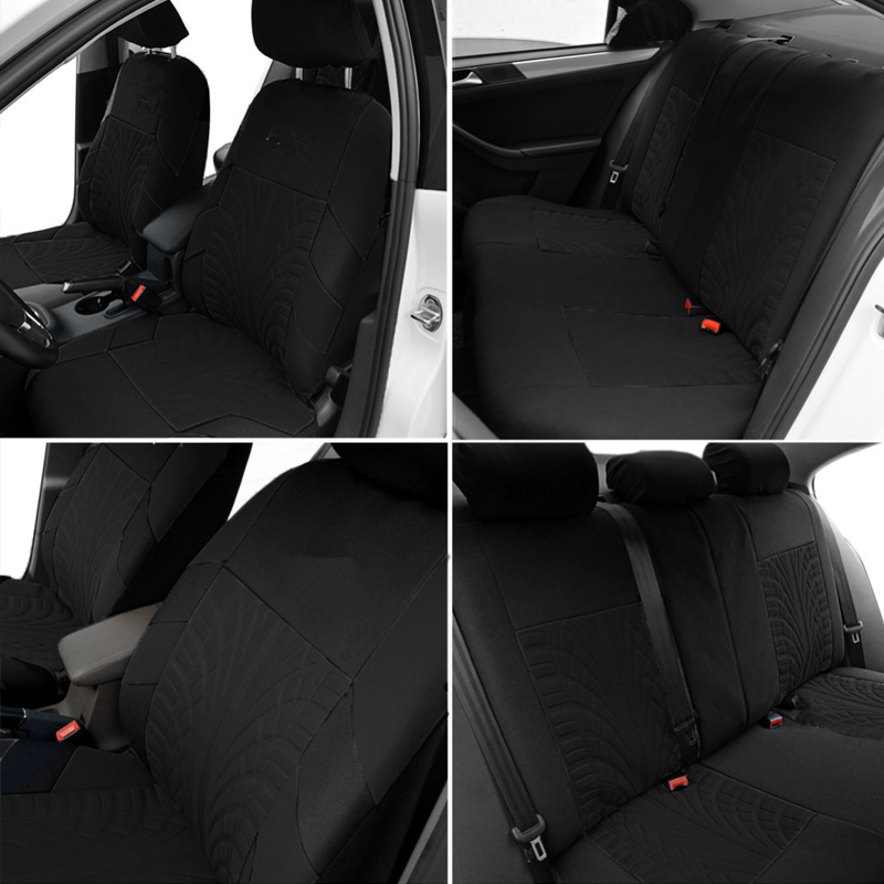 Авточохли універсальні чорного кольору  з тіснення на спинці